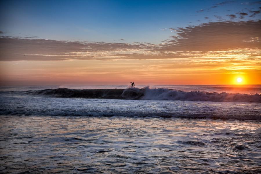 Surfer riding high at Sunrise Prints Bill McKim Photography